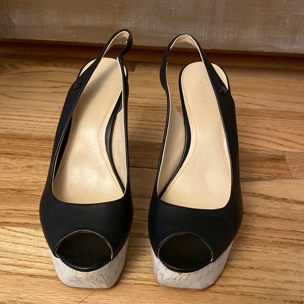 Calvin Klein black and white platform slingback’s